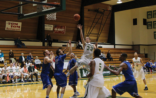 Zach Ginter released a floater as he penetrated Lane’s defense, scoring 13 of Umpqua’s 64 points Wednesday night.