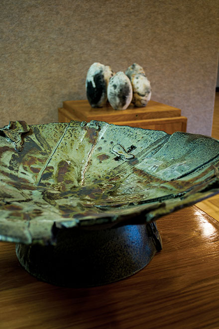 Ted Isto has a variety of ceramic pieces on display in the gallery based off his experiences as an artist.