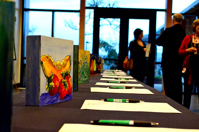A silent art auction, held Feb. 13, raised $3,440 for the new Veterans Center. Artist Linda Aman, wife of UCC Vice President of Student Services Rick Aman, donated 30 paintings which she painted in 30 days. 