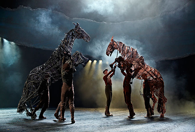 Albert Narracott rides upon his beloved Joey in Handspring Puppet Company’s War Horse production.