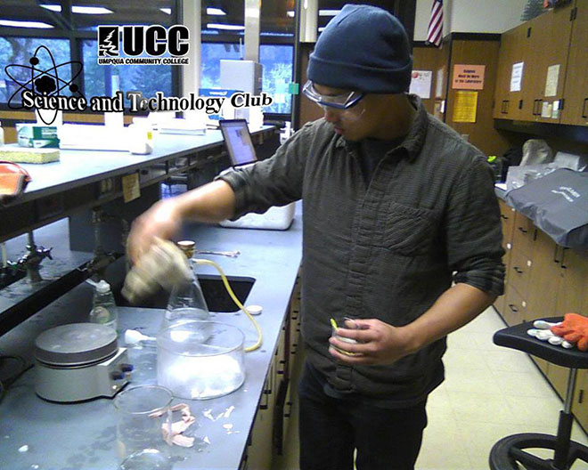 Ben Chu works with dry ice and CO2 gas in Science club, showing that carbon dioxide is denser than air.